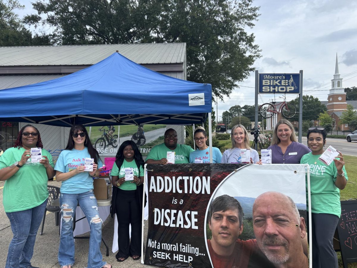 Moore's bike shop hosted an event for "Save a Life day", handing out free Naloxone.