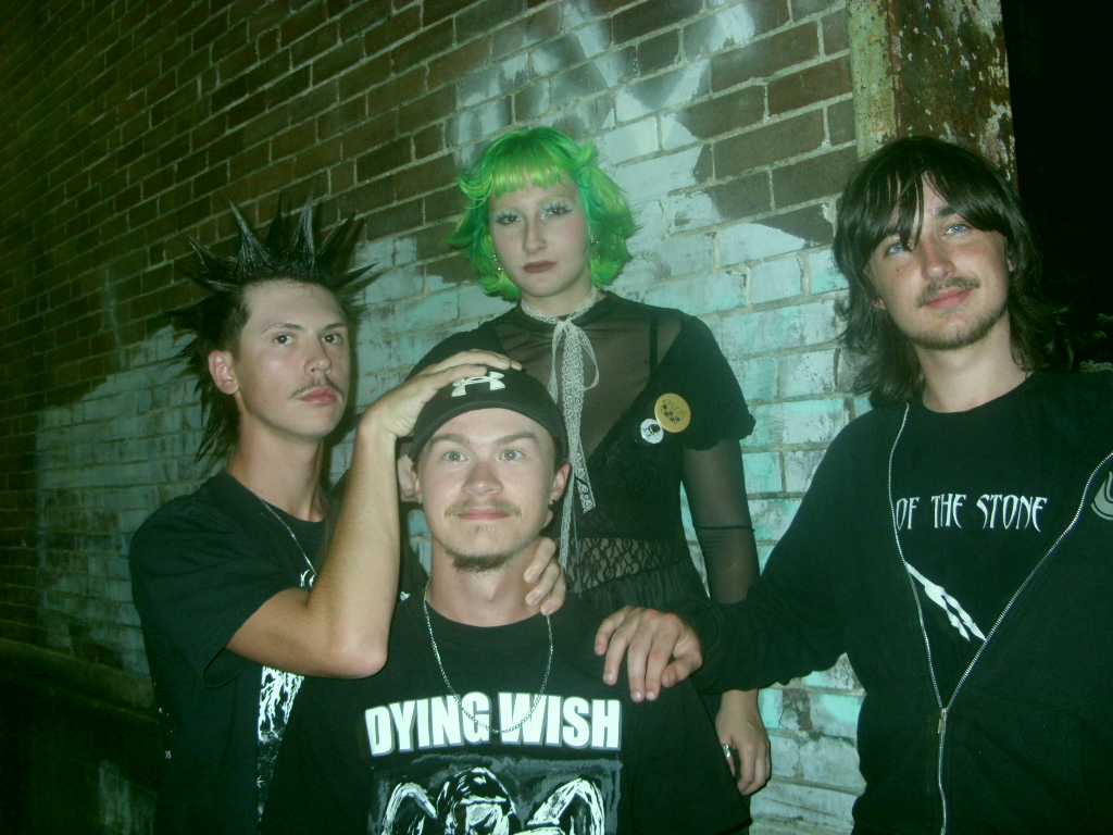 Charcoal members Nate Beach (left), Brayden Dupree (bottom center), Farrah Wild (top center) and Joshua Wheeler (right).