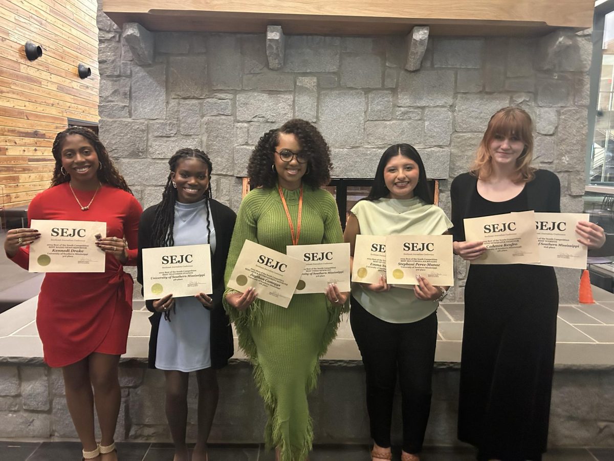 SM2 students with awards from Best of the South.