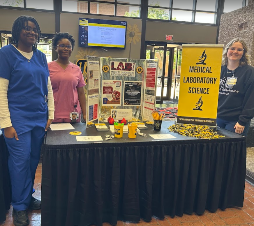 Medical Laboratory Science students at program booth during blood drive.